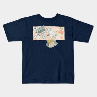 A cat laying on the table Kids T-Shirt